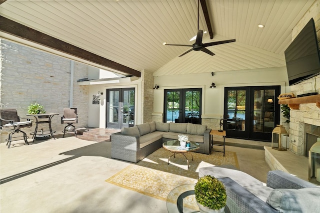 1001 Lakeshore Dr, Marble Falls, TX 78654 - view of patio / terrace with french doors, an outdoor living space with a fireplace, and a ceiling fan