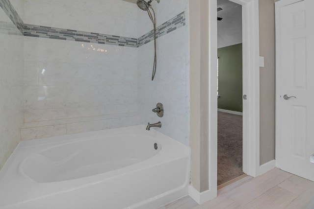 15811 De Peer Cv, Austin, TX 78717 - bathroom with baseboards and bathing tub / shower combination