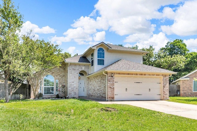 15811 De Peer Cv, Austin, TX 78717 - view of front of property with an attached garage, concrete driveway, brick siding, and roof with shingles
