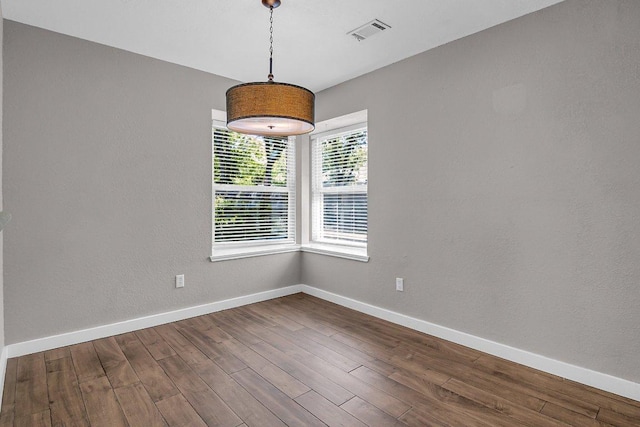 15811 De Peer Cv, Austin, TX 78717 - spare room with baseboards and dark wood-type flooring