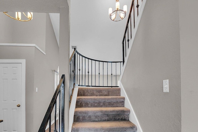 15811 De Peer Cv, Austin, TX 78717 - staircase with a chandelier and a high ceiling