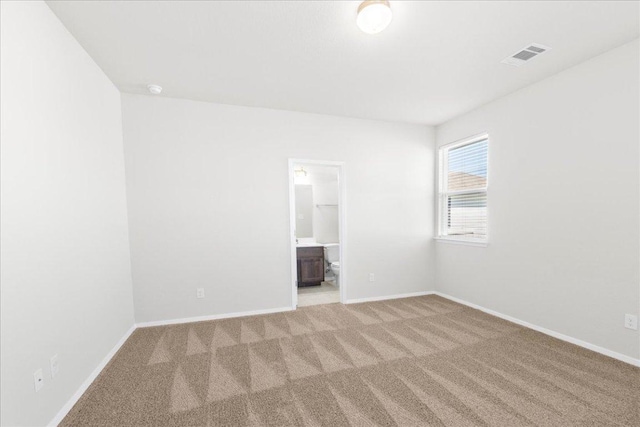 252 Fabion St, Kyle, TX 78640 - spare room featuring carpet and baseboards