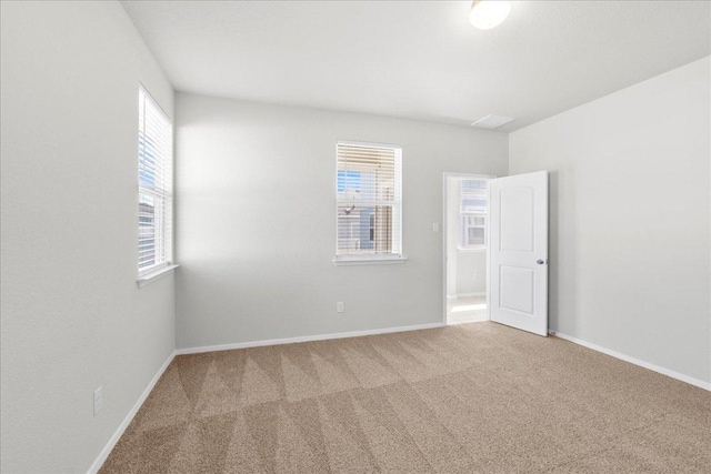 252 Fabion St, Kyle, TX 78640 - carpeted spare room with baseboards