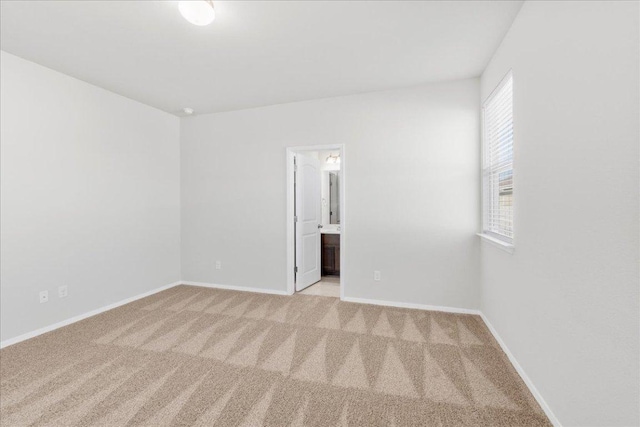 252 Fabion St, Kyle, TX 78640 - carpeted empty room with baseboards