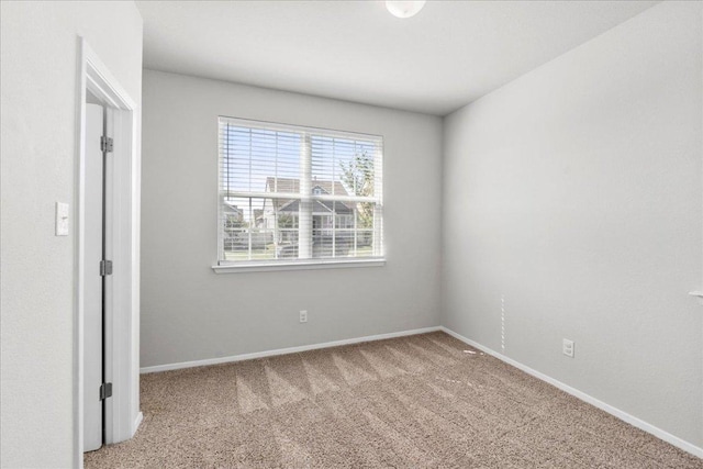 252 Fabion St, Kyle, TX 78640 - empty room featuring carpet flooring and baseboards