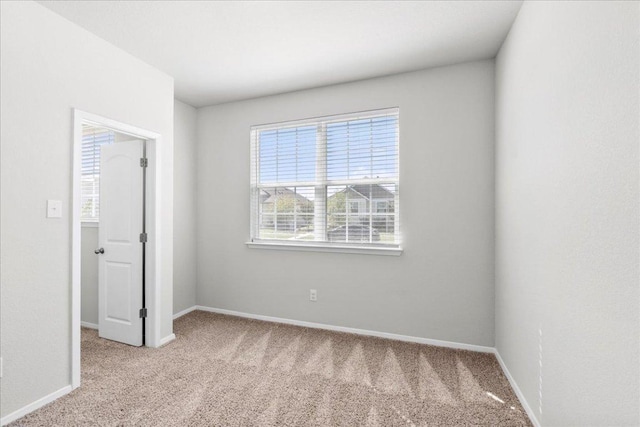 252 Fabion St, Kyle, TX 78640 - carpeted empty room featuring baseboards