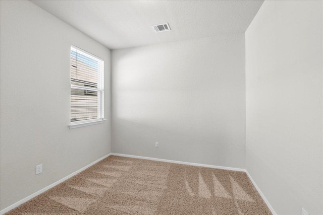252 Fabion St, Kyle, TX 78640 - spare room featuring carpet and baseboards