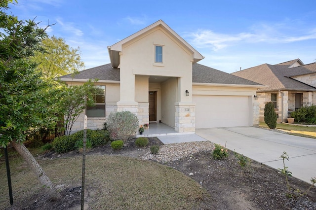 344 Pisa Ln, Georgetown, TX 78628 - view of front facade featuring stone siding, stucco siding, a garage, and roof with shingles