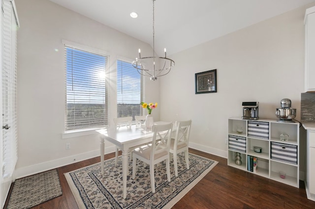 344 Pisa Ln, Georgetown, TX 78628 - dining area featuring a chandelier, baseboards, dark wood-type flooring, and recessed lighting