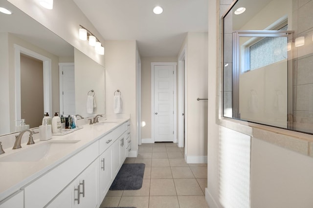344 Pisa Ln, Georgetown, TX 78628 - full bathroom featuring double vanity, baseboards, tile patterned flooring, a shower with door, and recessed lighting