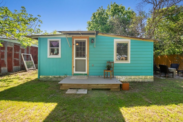 523 Ash St, Lockhart, TX 78644 - view of outdoor structure with an outbuilding and fence