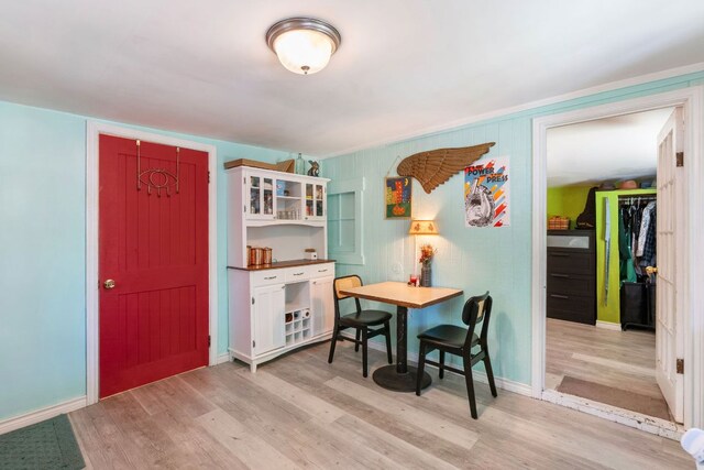 523 Ash St, Lockhart, TX 78644 - dining space with light wood-style flooring and baseboards