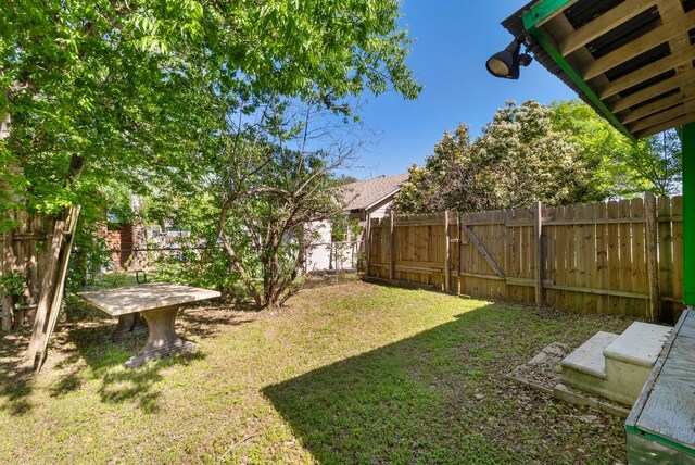 523 Ash St, Lockhart, TX 78644 - view of yard featuring a fenced backyard