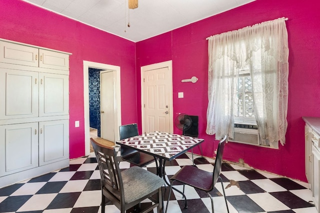 523 Ash St, Lockhart, TX 78644 - dining area with cooling unit and dark floors