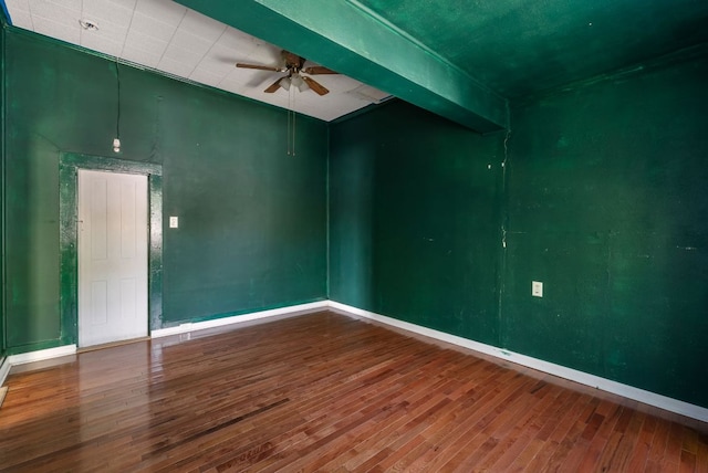523 Ash St, Lockhart, TX 78644 - unfurnished room with baseboards, a ceiling fan, and wood finished floors