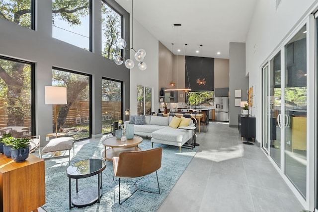 5908 Lakeside Trl, Austin, TX 78734 - living room with a high ceiling, recessed lighting, and tile patterned floors