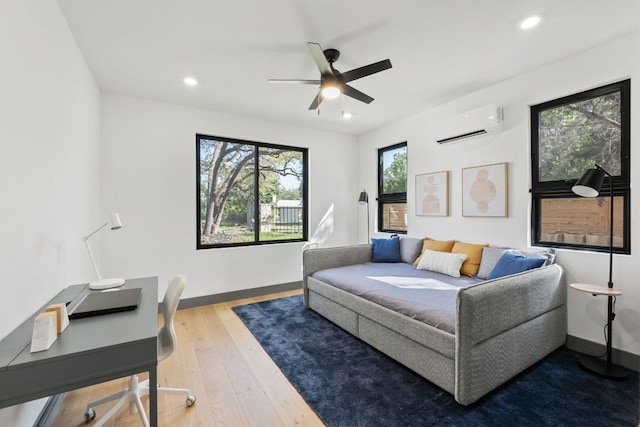 5908 Lakeside Trl, Austin, TX 78734 - bedroom featuring a wall unit AC, wood finished floors, recessed lighting, baseboards, and a ceiling fan