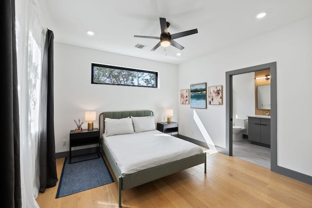5908 Lakeside Trl, Austin, TX 78734 - bedroom with light wood-style floors, baseboards, recessed lighting, a ceiling fan, and ensuite bathroom
