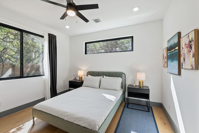 5908 Lakeside Trl, Austin, TX 78734 - bedroom with multiple windows, light wood-type flooring, recessed lighting, baseboards, and ceiling fan