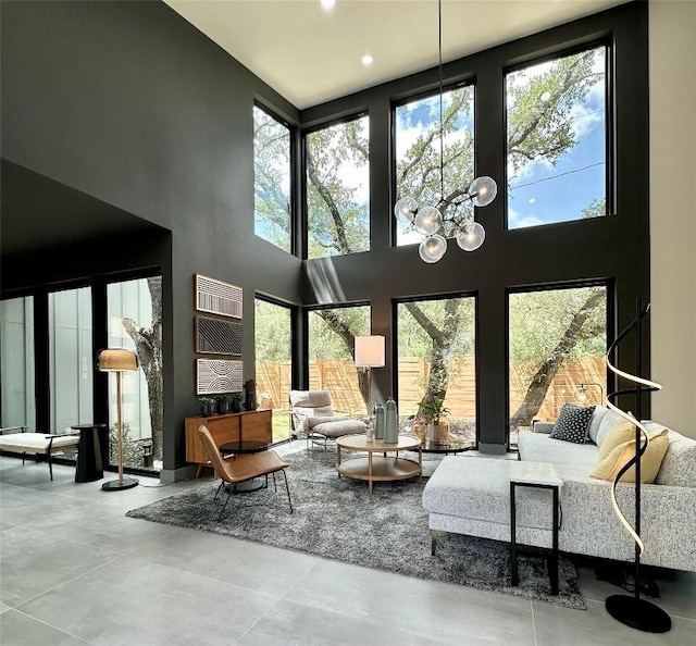 5908 Lakeside Trl, Austin, TX 78734 - living area featuring a towering ceiling, a chandelier, and recessed lighting
