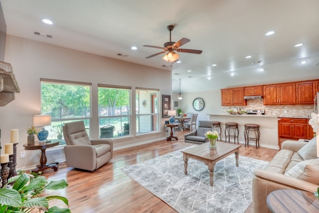 103 Ladera Cv, Marble Falls, TX 78654 - living area featuring ceiling fan, recessed lighting, light wood-style flooring, and baseboards