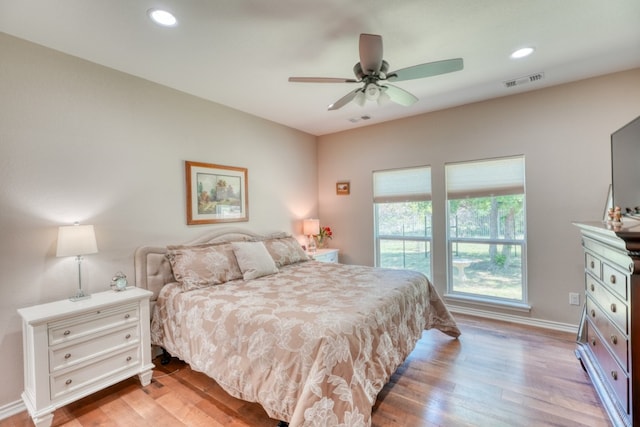 103 Ladera Cv, Marble Falls, TX 78654 - bedroom featuring light wood-style flooring, baseboards, recessed lighting, and ceiling fan