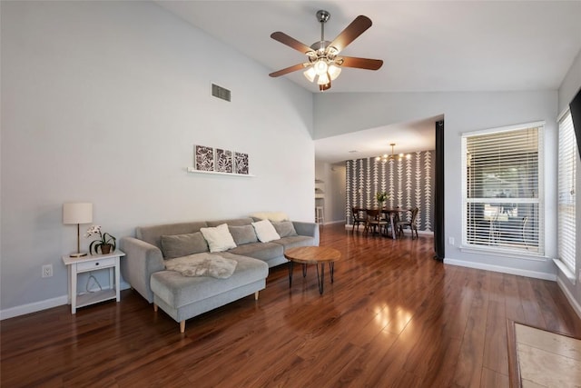 14585 Robert I Walker Blvd, Austin, TX 78728 - living room featuring lofted ceiling, wood finished floors, a ceiling fan, and a chandelier