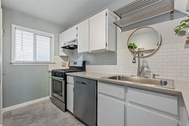 14585 Robert I Walker Blvd, Austin, TX 78728 - kitchen featuring stainless steel appliances, under cabinet range hood, tasteful backsplash, white cabinetry, and light countertops