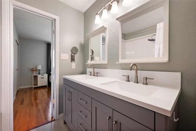 14585 Robert I Walker Blvd, Austin, TX 78728 - full bathroom with double vanity and baseboards