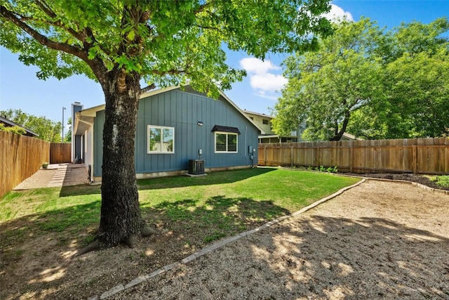14585 Robert I Walker Blvd, Austin, TX 78728 - rear view of house featuring board and batten siding and central AC