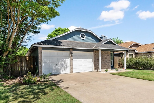 14585 Robert I Walker Blvd, Austin, TX 78728 - ranch-style house with an attached garage, brick siding, driveway, and a shingled roof