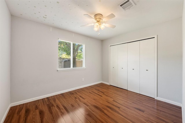 14585 Robert I Walker Blvd, Austin, TX 78728 - unfurnished bedroom featuring wood finished floors, a closet, and a ceiling fan