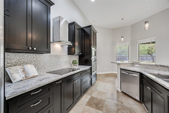 21434 Lakefront Dr, Lago Vista, TX 78645 - kitchen with appliances with stainless steel finishes, wall chimney range hood, backsplash, baseboards, and light stone counters