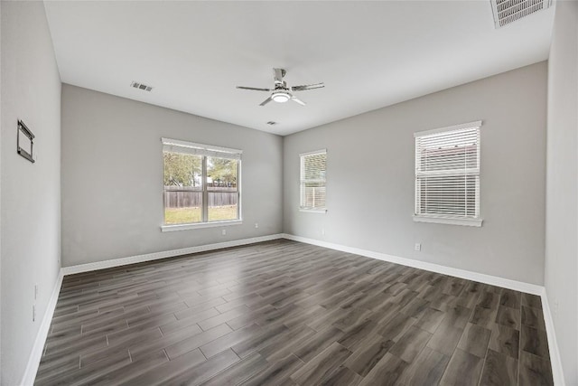 21434 Lakefront Dr, Lago Vista, TX 78645 - unfurnished room with ceiling fan and dark wood-style flooring