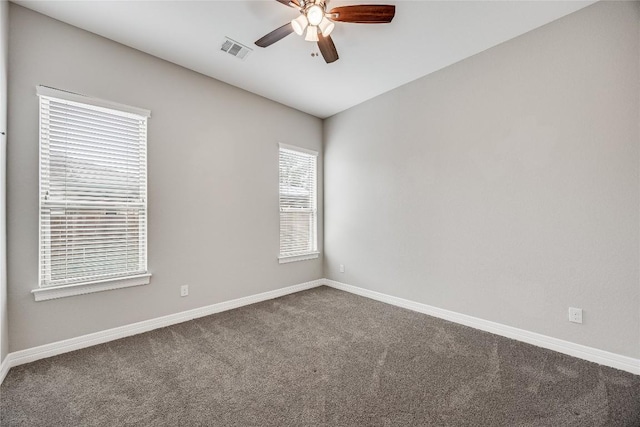 21434 Lakefront Dr, Lago Vista, TX 78645 - carpeted spare room with a ceiling fan and baseboards