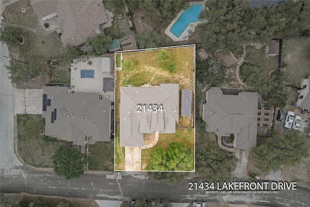 21434 Lakefront Dr, Lago Vista, TX 78645 - aerial view of property's location featuring a pool and property boundaries highlighted