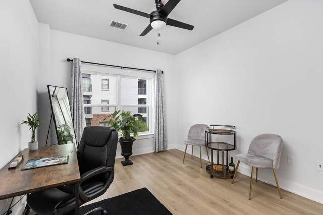 2500 Longview St Unit 418, Austin, TX 78705 - office area with ceiling fan, wood finished floors, and baseboards