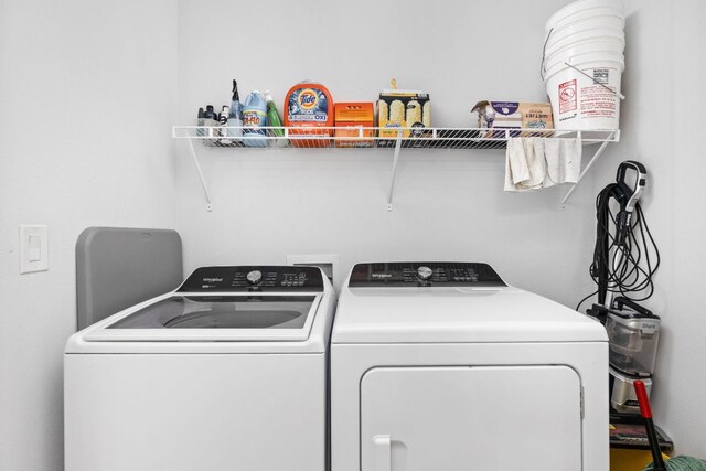 2500 Longview St Unit 418, Austin, TX 78705 - washroom featuring washing machine and dryer