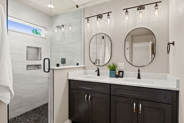 125 Channel Dr, Sunrise Beach, TX 78643 - full bath featuring double vanity, a shower stall, and a sink