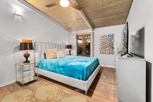 2301 Westway Cir, Austin, TX 78704 - bedroom featuring baseboards, wood finished floors, wooden ceiling, french doors, and access to exterior