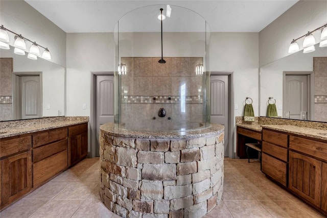202 Bridgepoint Dr, Kingsland, TX 78639 - full bathroom with tile patterned floors, walk in shower, and vanity