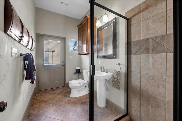 202 Bridgepoint Dr, Kingsland, TX 78639 - bathroom with toilet and a stall shower