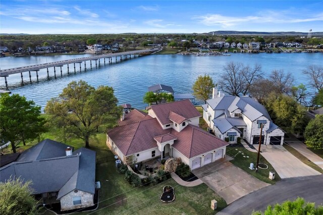 202 Bridgepoint Dr, Kingsland, TX 78639 - aerial perspective of suburban area featuring a notable bridge and a large body of water