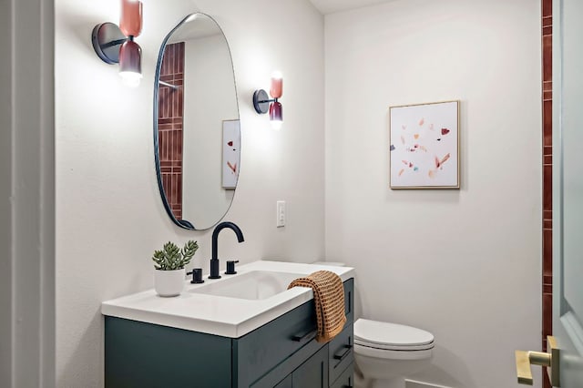 7614 Watson St, Austin, TX 78757 - full bath with vanity, toilet, and a shower