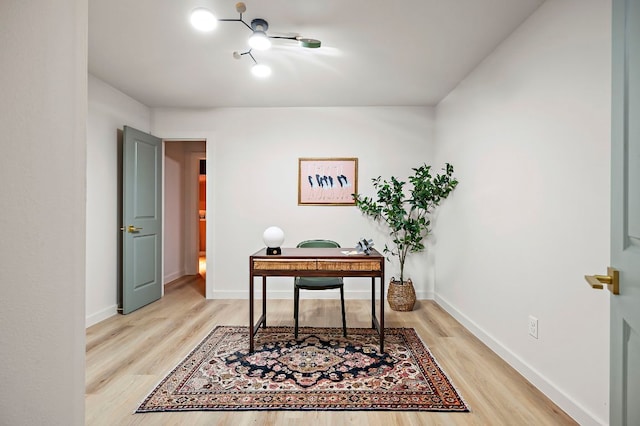 7614 Watson St, Austin, TX 78757 - office featuring light wood-style floors and baseboards