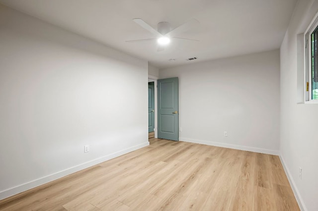 7614 Watson St, Austin, TX 78757 - unfurnished room with ceiling fan, light wood-type flooring, and baseboards