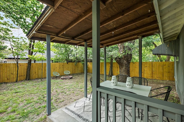 7614 Watson St, Austin, TX 78757 - fenced backyard with outdoor dining space and a patio area