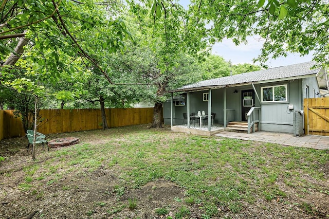 7614 Watson St, Austin, TX 78757 - rear view of house featuring roof with shingles