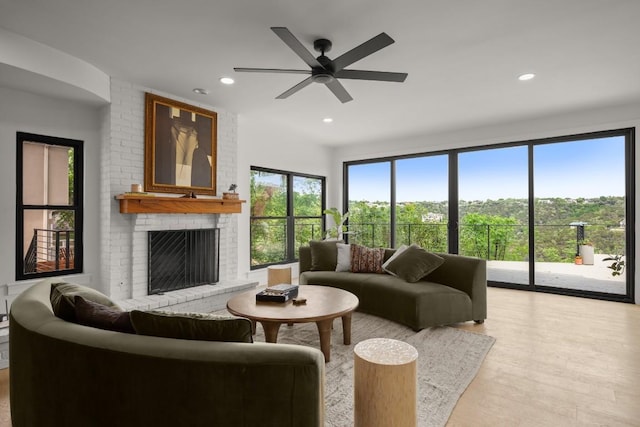 4328 Far W Blvd, Austin, TX 78731 - living area with recessed lighting, ceiling fan, wood finished floors, and a fireplace