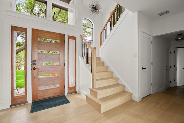 4328 Far W Blvd, Austin, TX 78731 - entrance foyer with wood finished floors and stairway